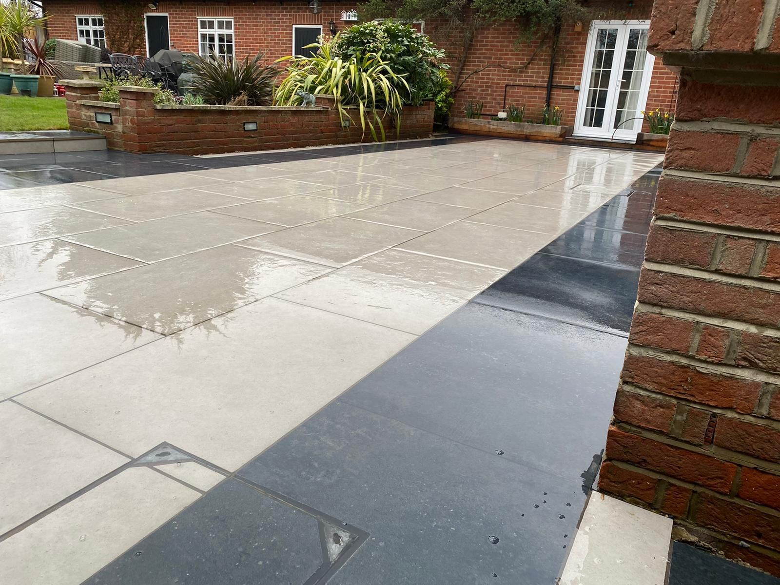 Garden Paver Patio with Trellis Japanese Stone Lantern Pagoda Waterfall Pond and Landscaping Lights