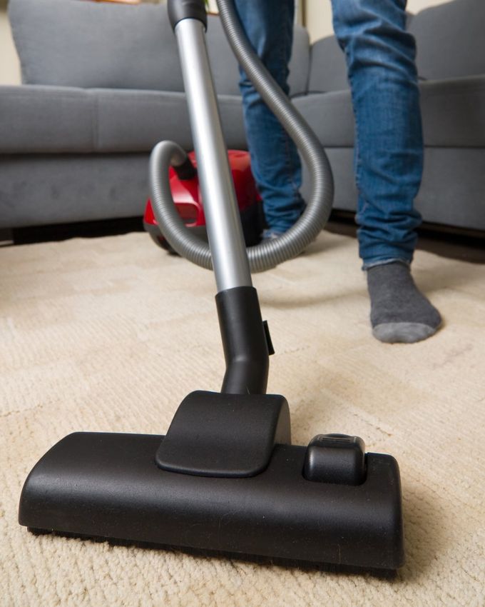 Cleaning Carpet with Vacuum Cleaner — Carpet Cleaning in Kawungan QLD