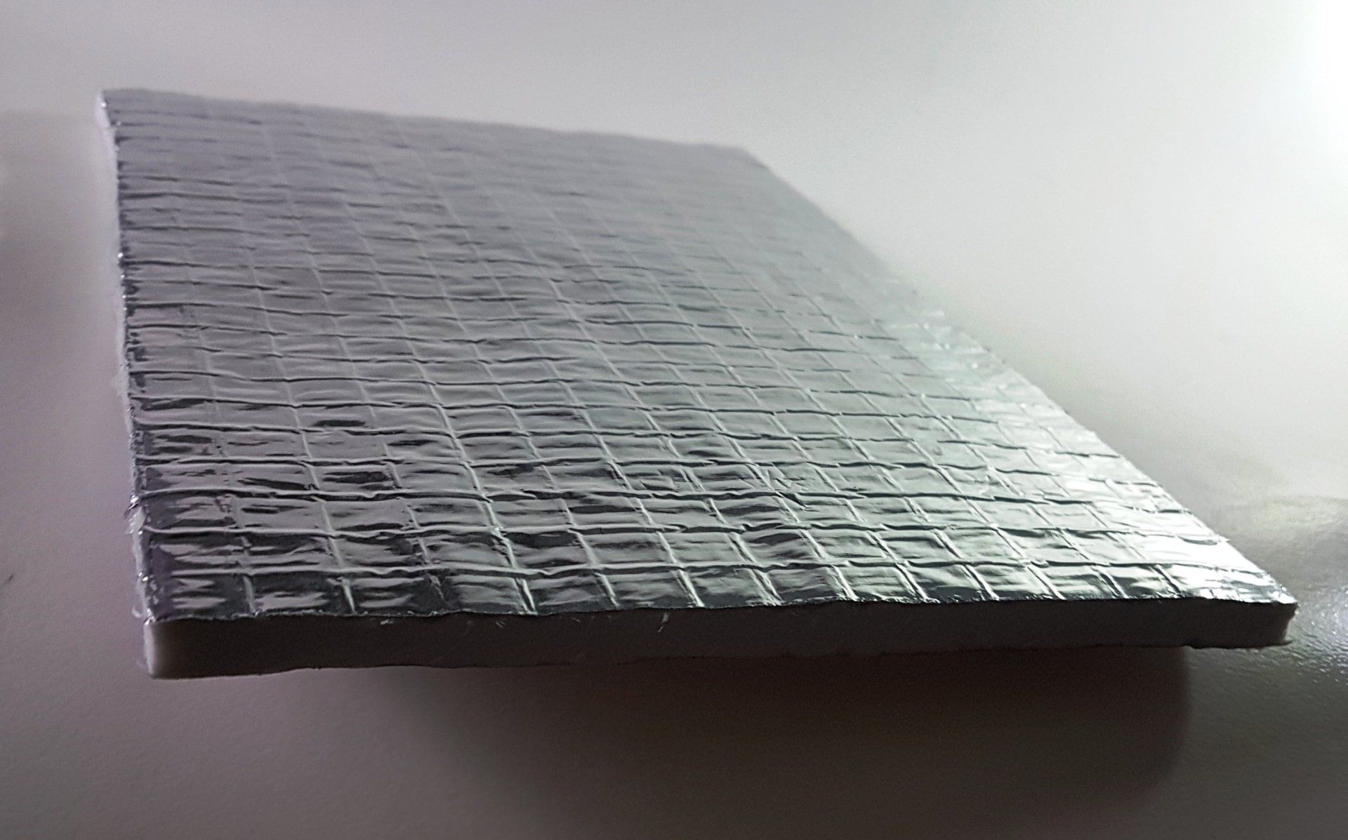 Anisotropic Carbon-Aerogel Thermal Insulation Shields Onboard Electronics from Extreme Foundry Heat