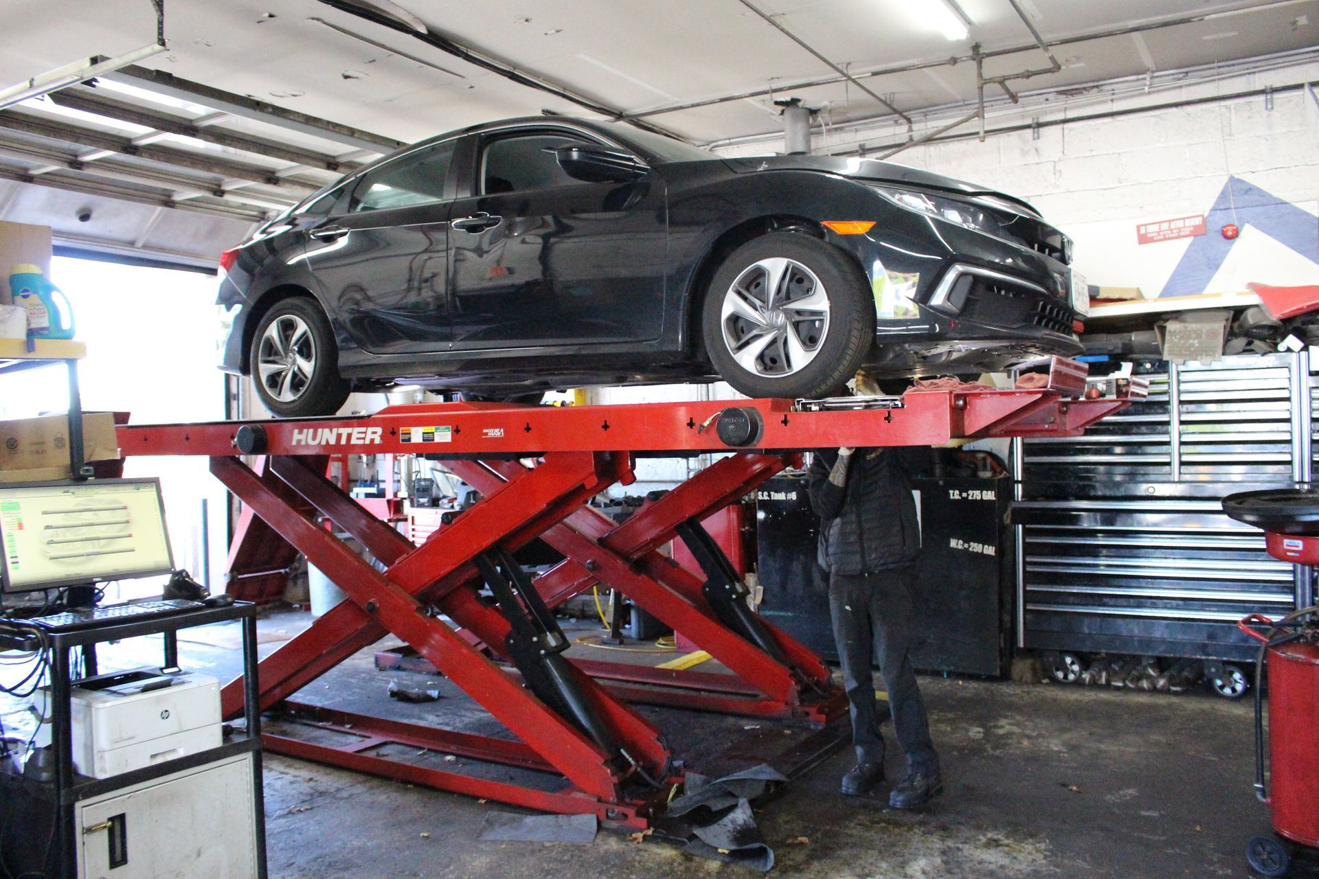 Our Mechanic in Inspecting a Car in Ronkonkoma, NY - Lakeview Car Care