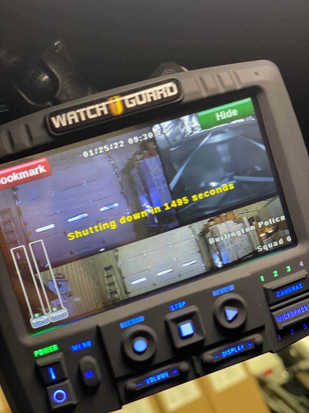 A monitor that says watch guard on it