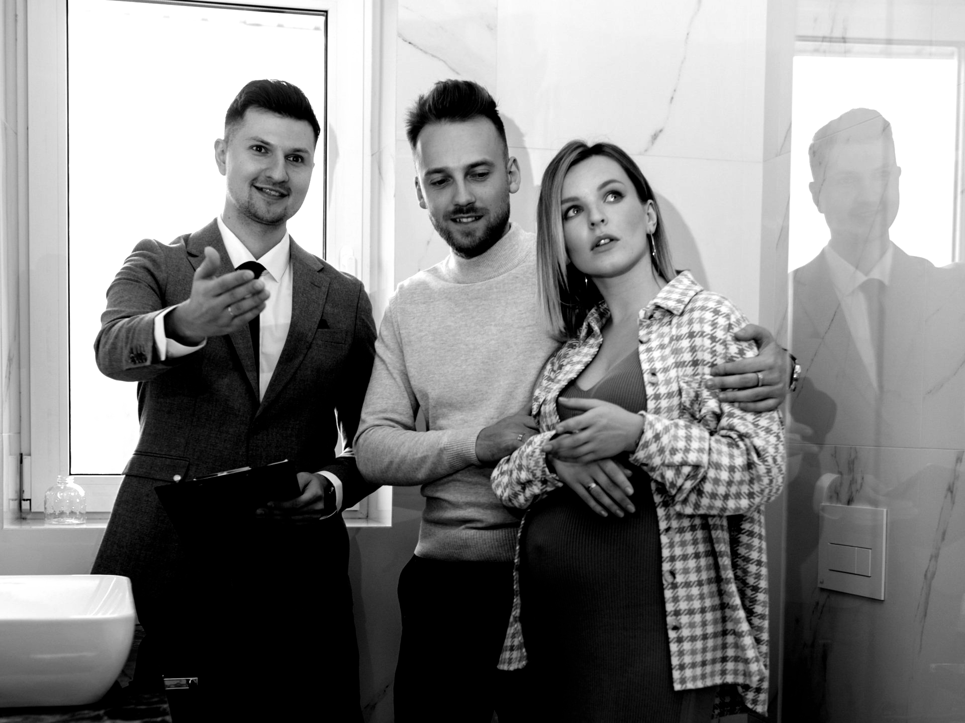 couple and real estate agent