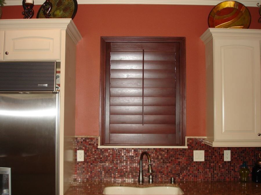 Wood Shutters in the Kitchen — Window Treatments in Destin, FL