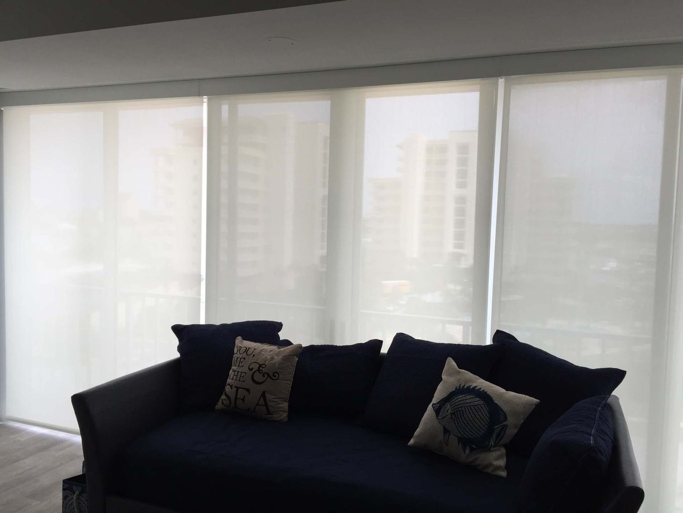Solar Screens Behind the Sofa — Window Treatments Showroom in Destin, FL