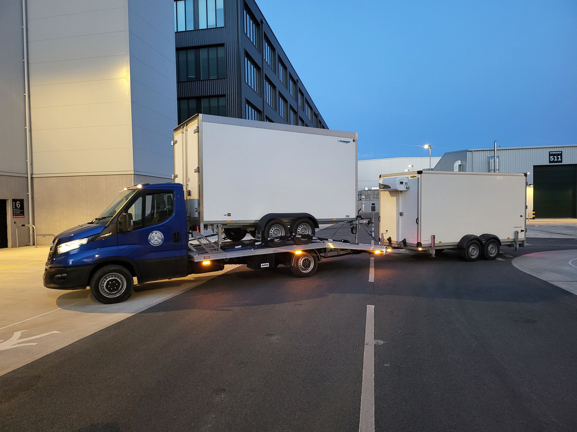 Delivery truck with two refrigerated trailers