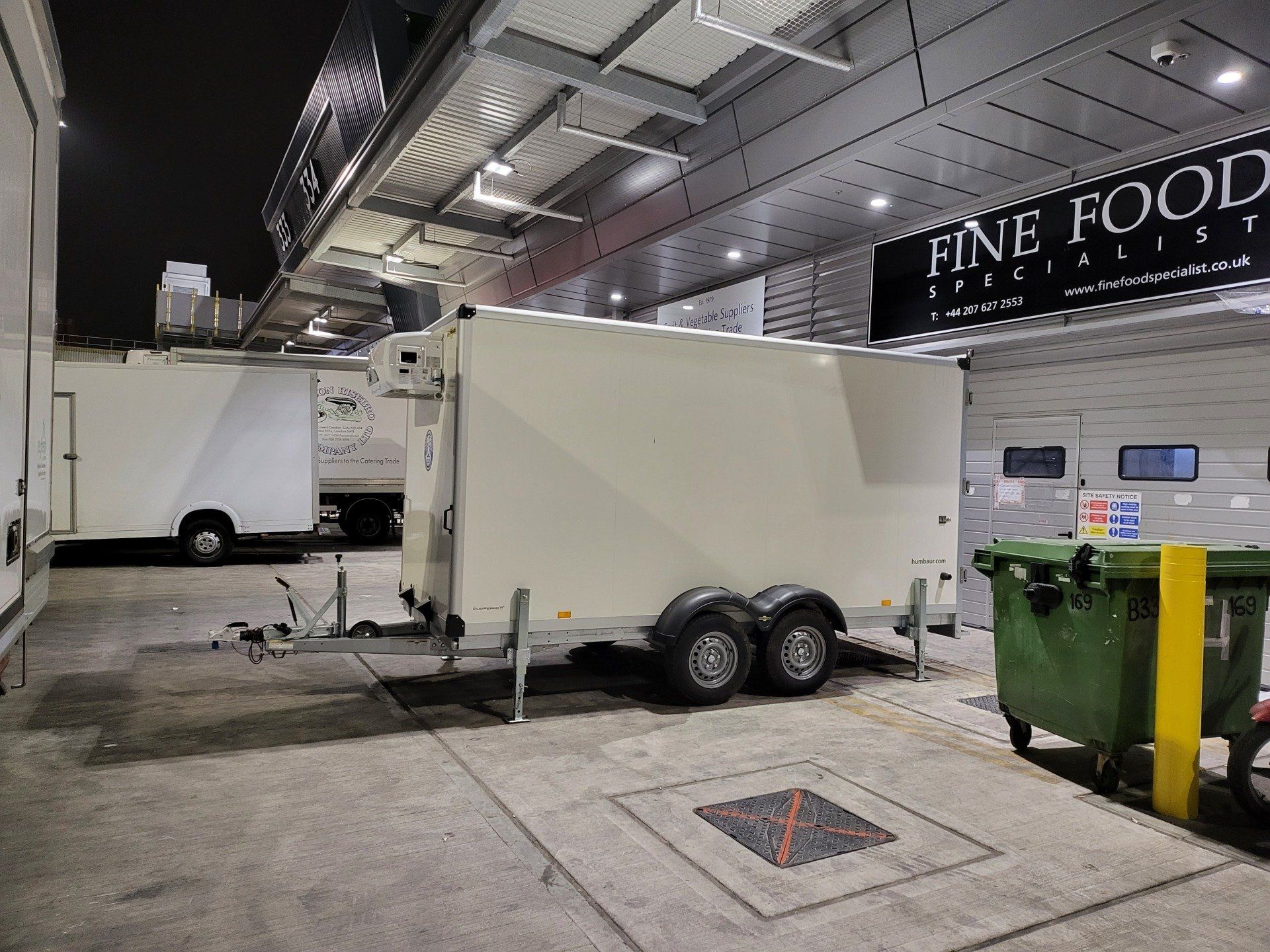 Freezer trailer in an industrial estate