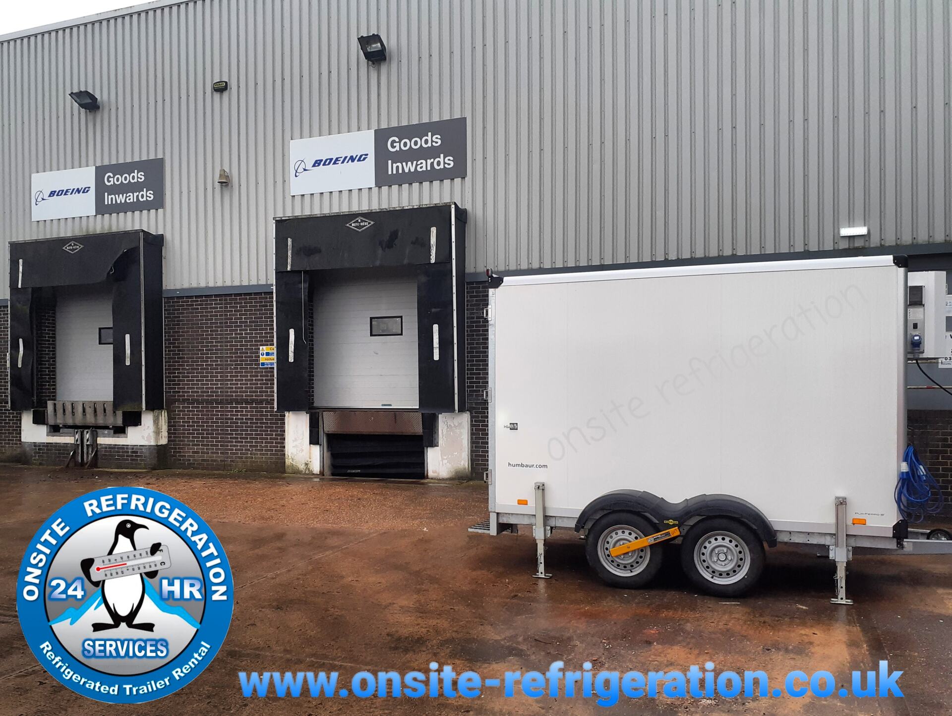 Refrigerated trailer outside a warehouse