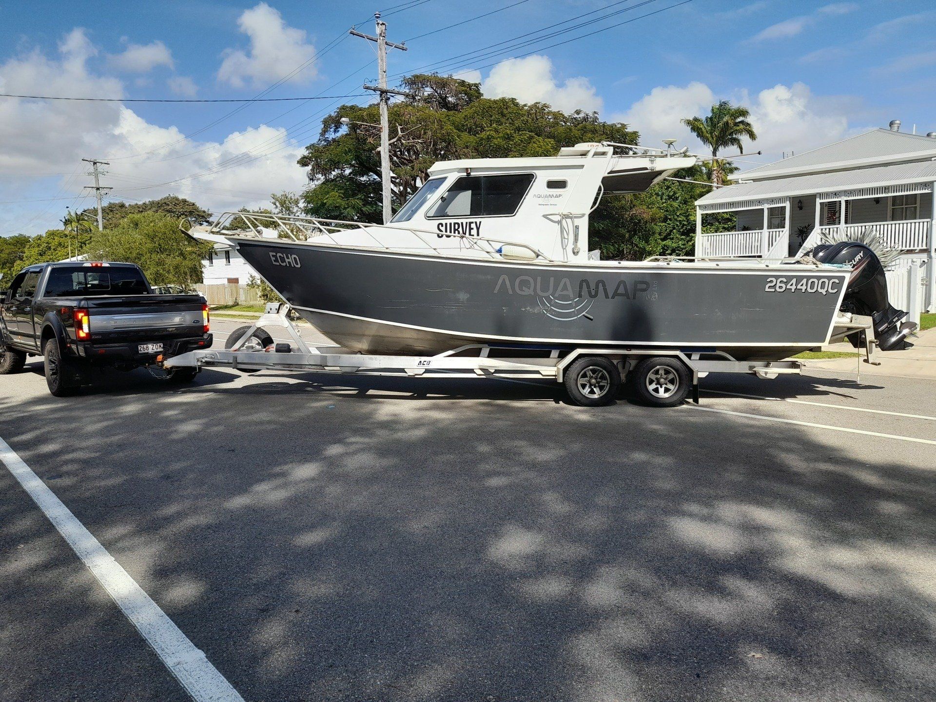 A Boat Towing by a Car | Townsville, Qld | Aquamap Pty Ltd Trading as Aquamap Hydrographic Services