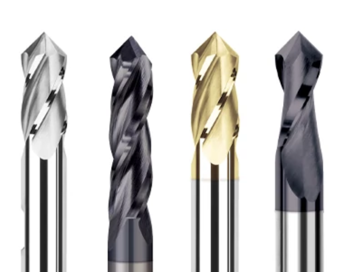 Four different types of drill bits are lined up on a white background
