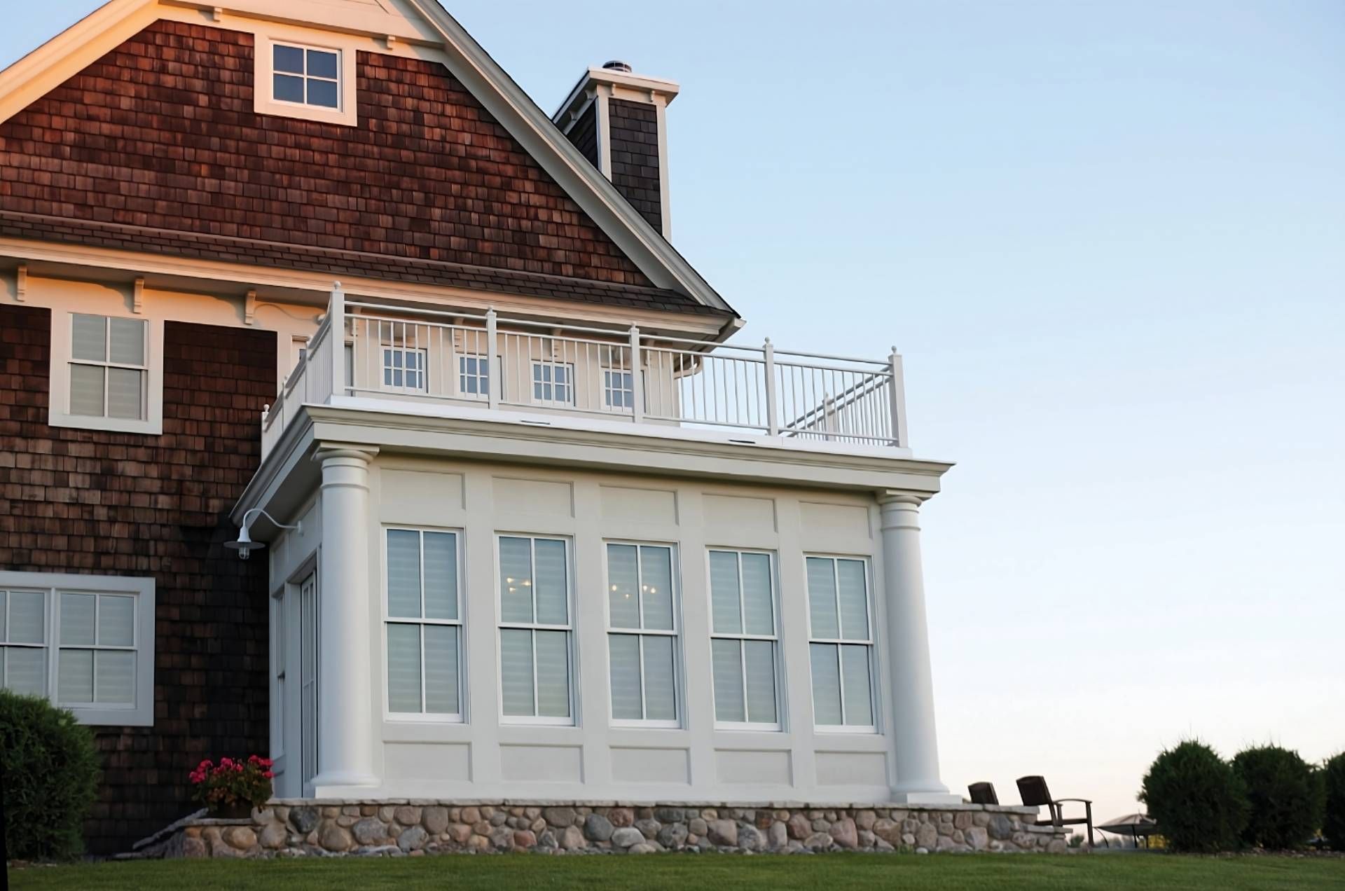 View of Hunter Douglas Silhouette® Sheer Shades from the outside of a home with a stunning exterior 