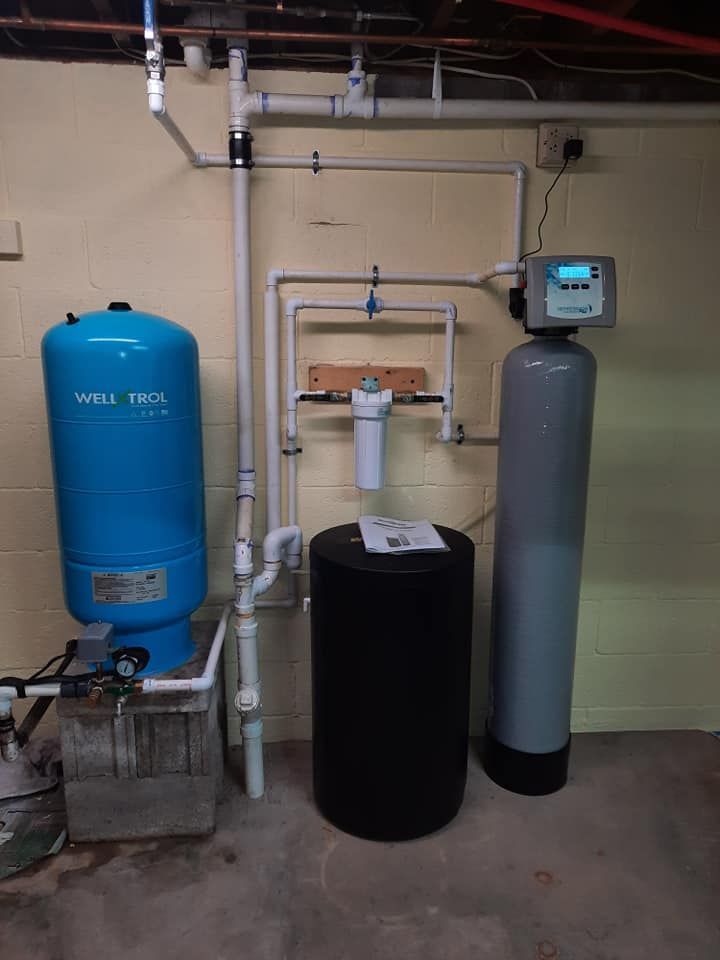 This customer had hardness, slight iron and bacteria. I corrected this with a water softener, house filter, and UV light.