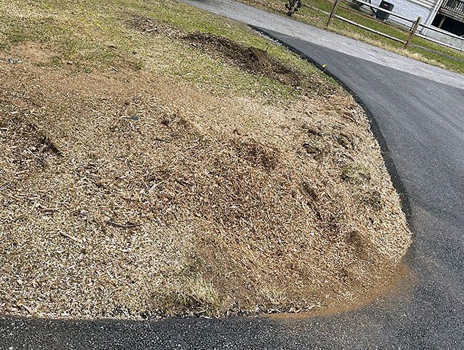 There is a lot of dirt on the side of the road.