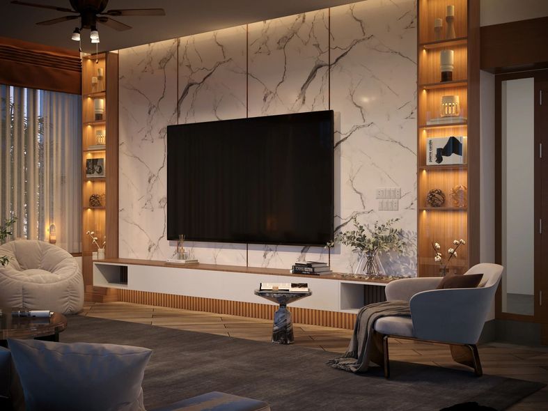 Living room with marble wall, large TV, built-in shelves, and cozy seating.