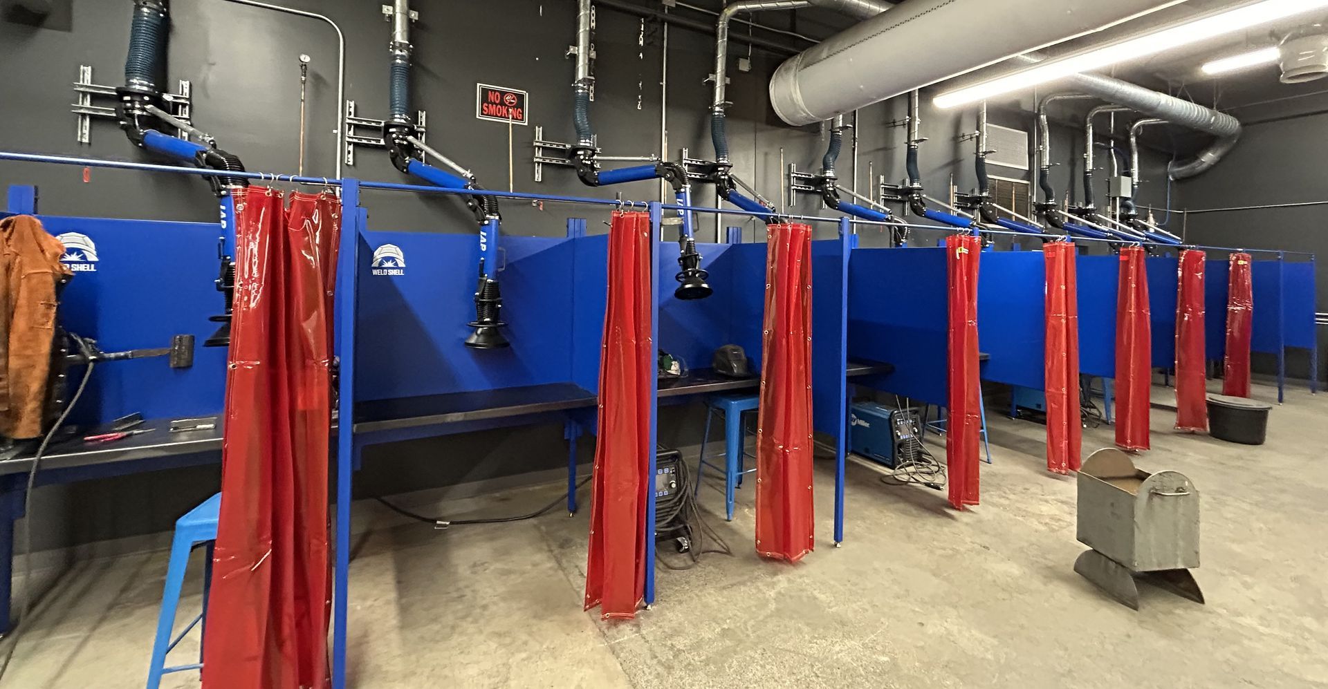 Source capture fume extraction with welding booths