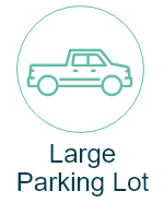 a large parking lot with a truck icon in a circle .