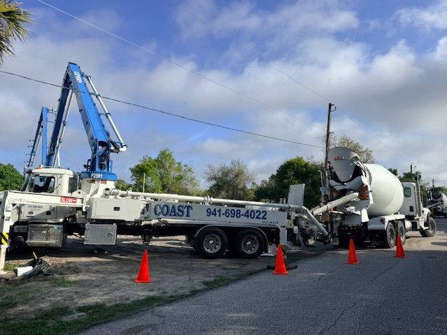 A concrete pump truck labeled