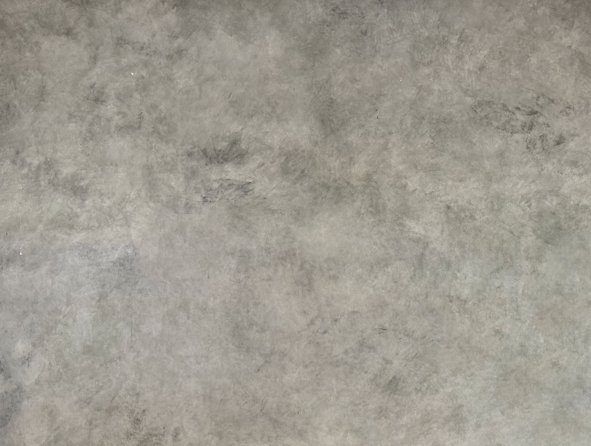 A close up of a gray concrete floor texture.