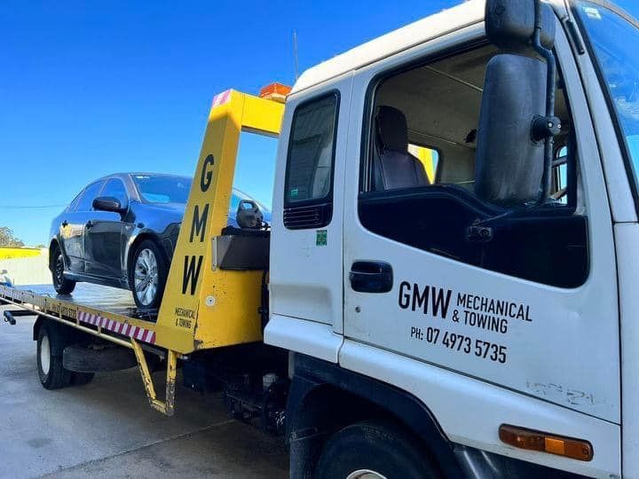 A White Van Is Being Towed by a Tow Truck | Gladstone, QLD | GMW Towing