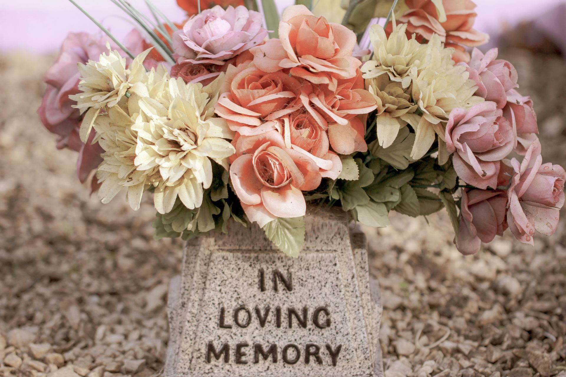 image of fresh flowers on a grave