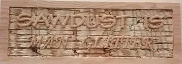 A wood-carved sign reading