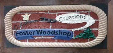 A brick-patterned sign with a rope border labeled