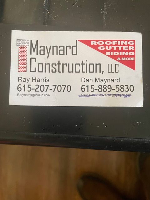 A business card for maynard construction llc
