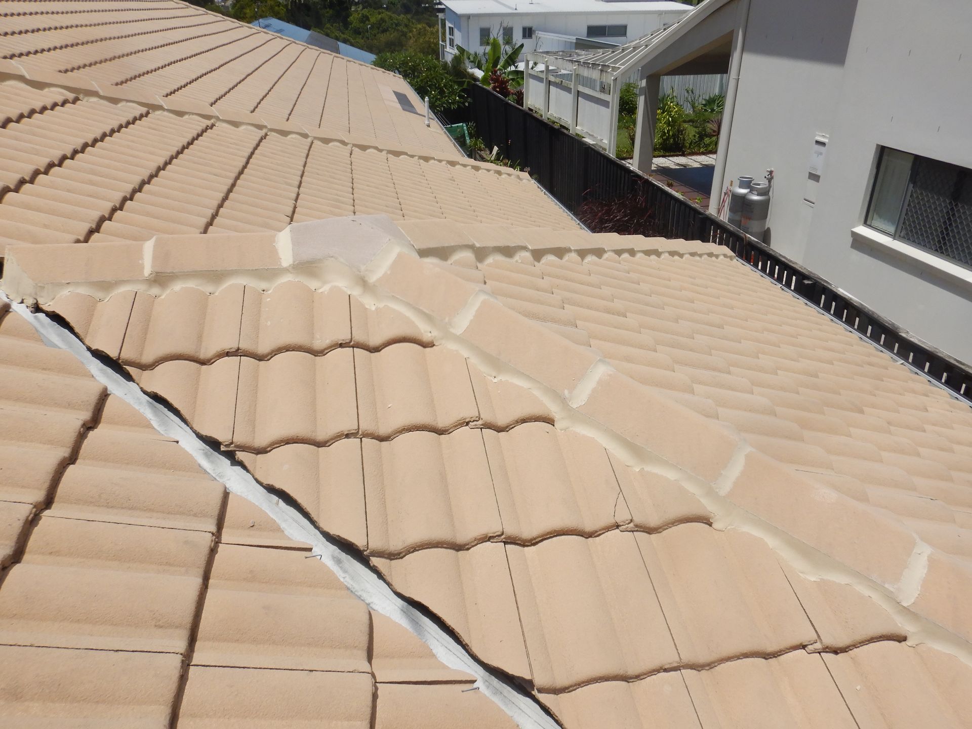 The Roof Of A House With Two Skylights On It — Gold Coast Roof Repairs in Tweed Heads, NSW