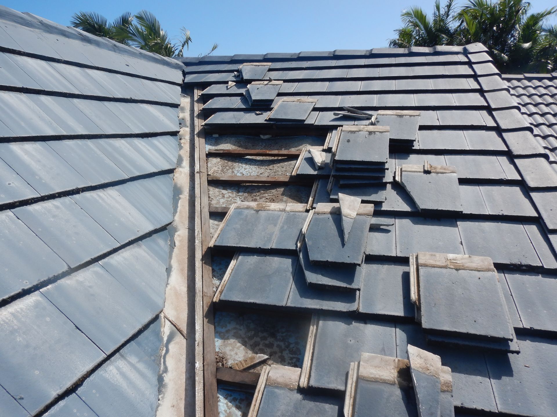 A Roof That Has Tiles Dismantled — Gold Coast Roof Repairs in Mudgeeraba, QLD