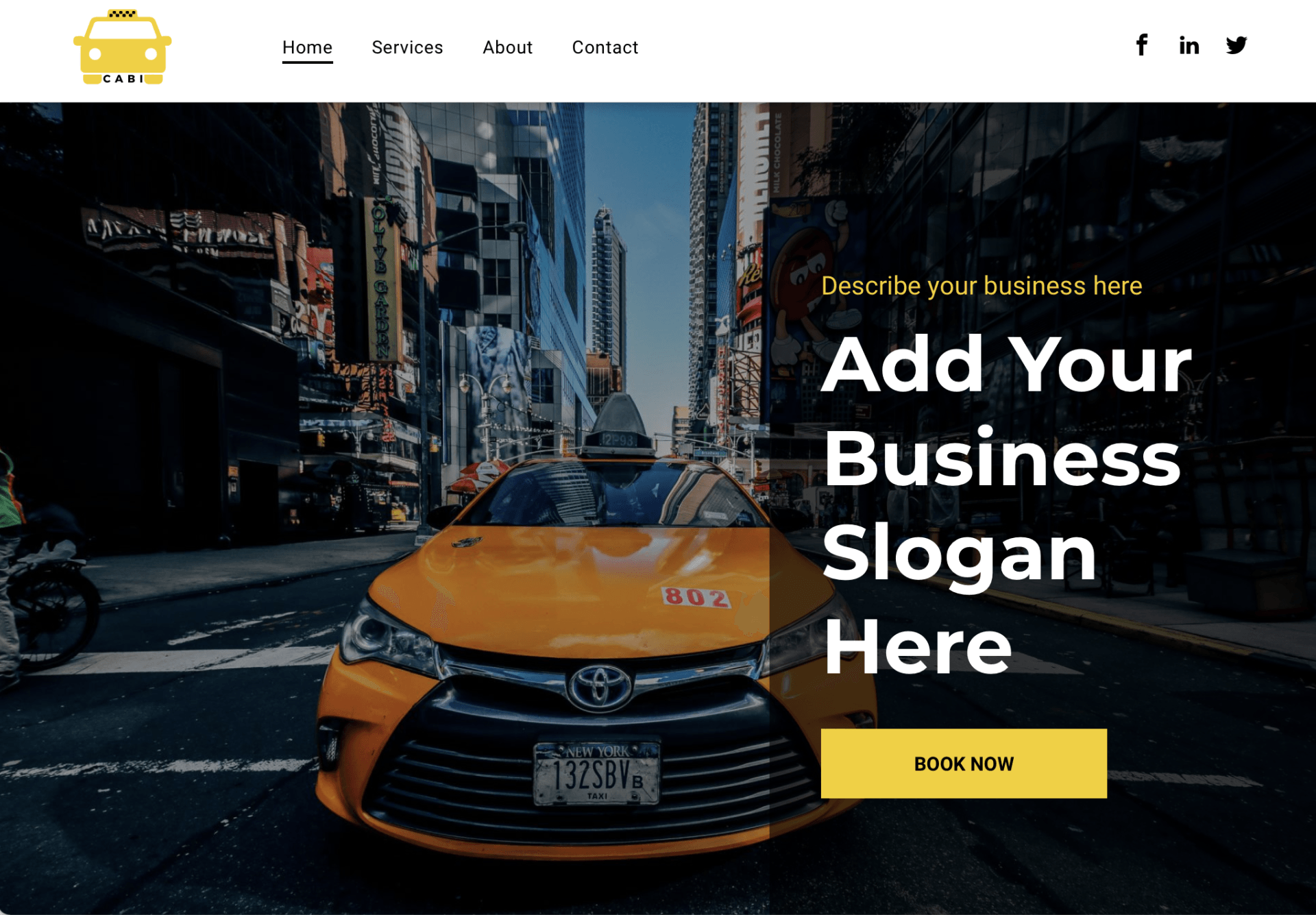 A yellow taxi is driving down a city street.