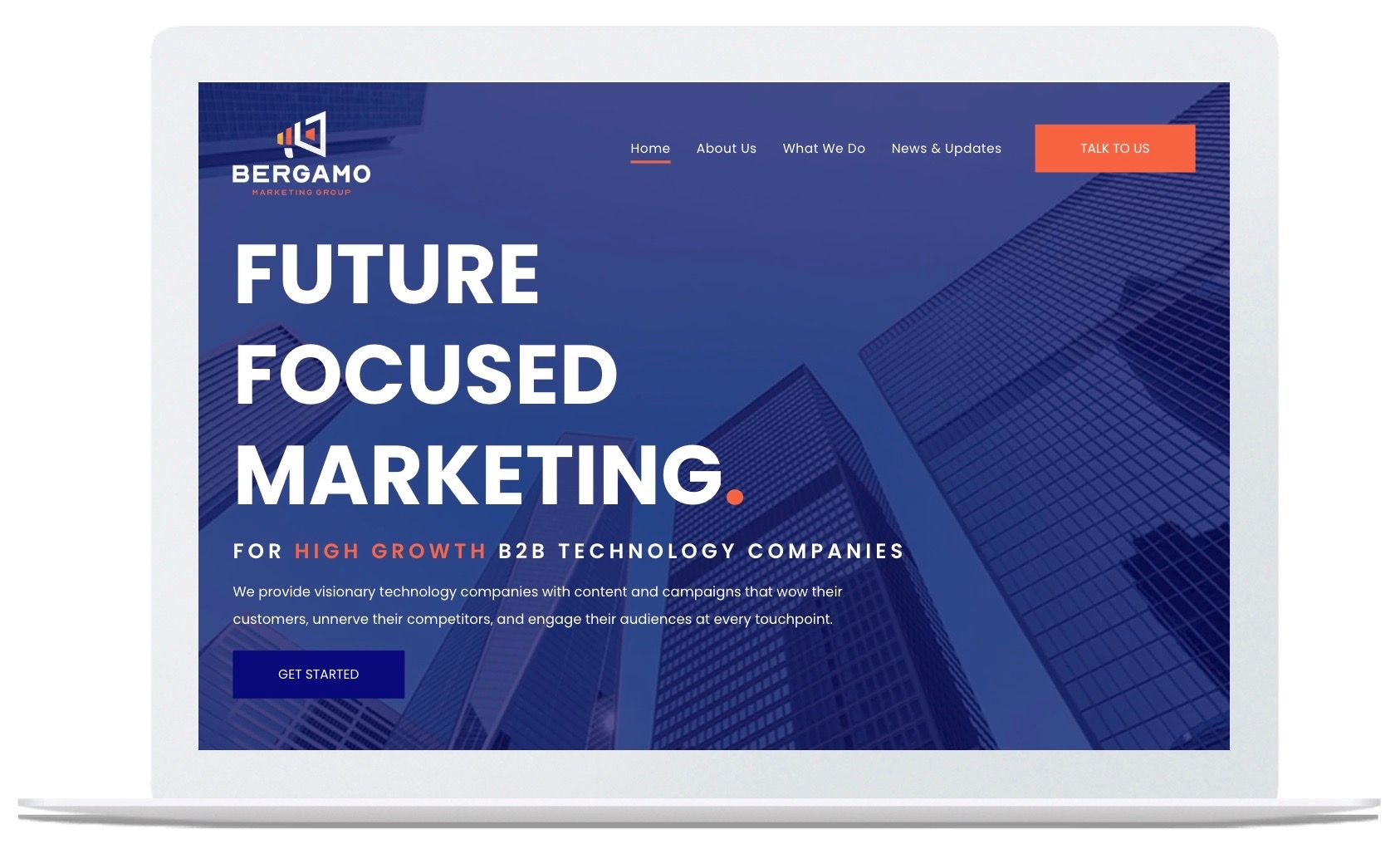 A laptop is open to a website that says future focused marketing.