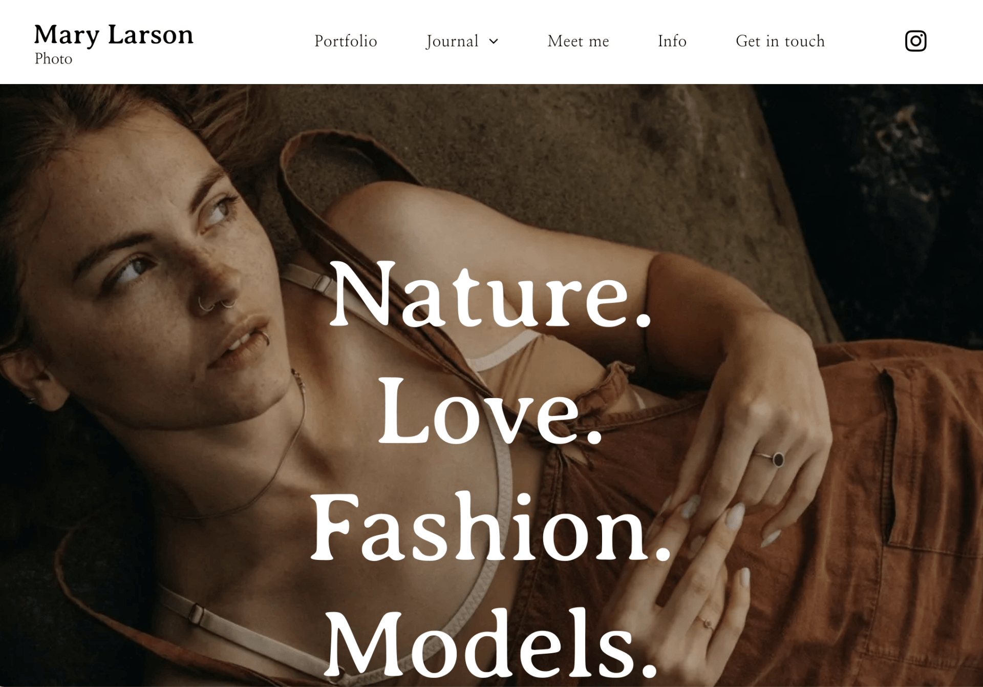 A woman is laying down on a bed with the words nature love fashion models on the bottom