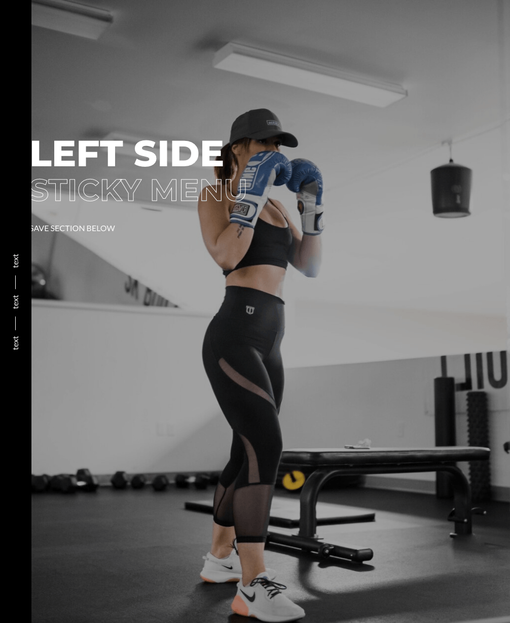 A woman wearing boxing gloves is standing in a gym.