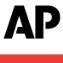 The ap logo is black and red on a white background.