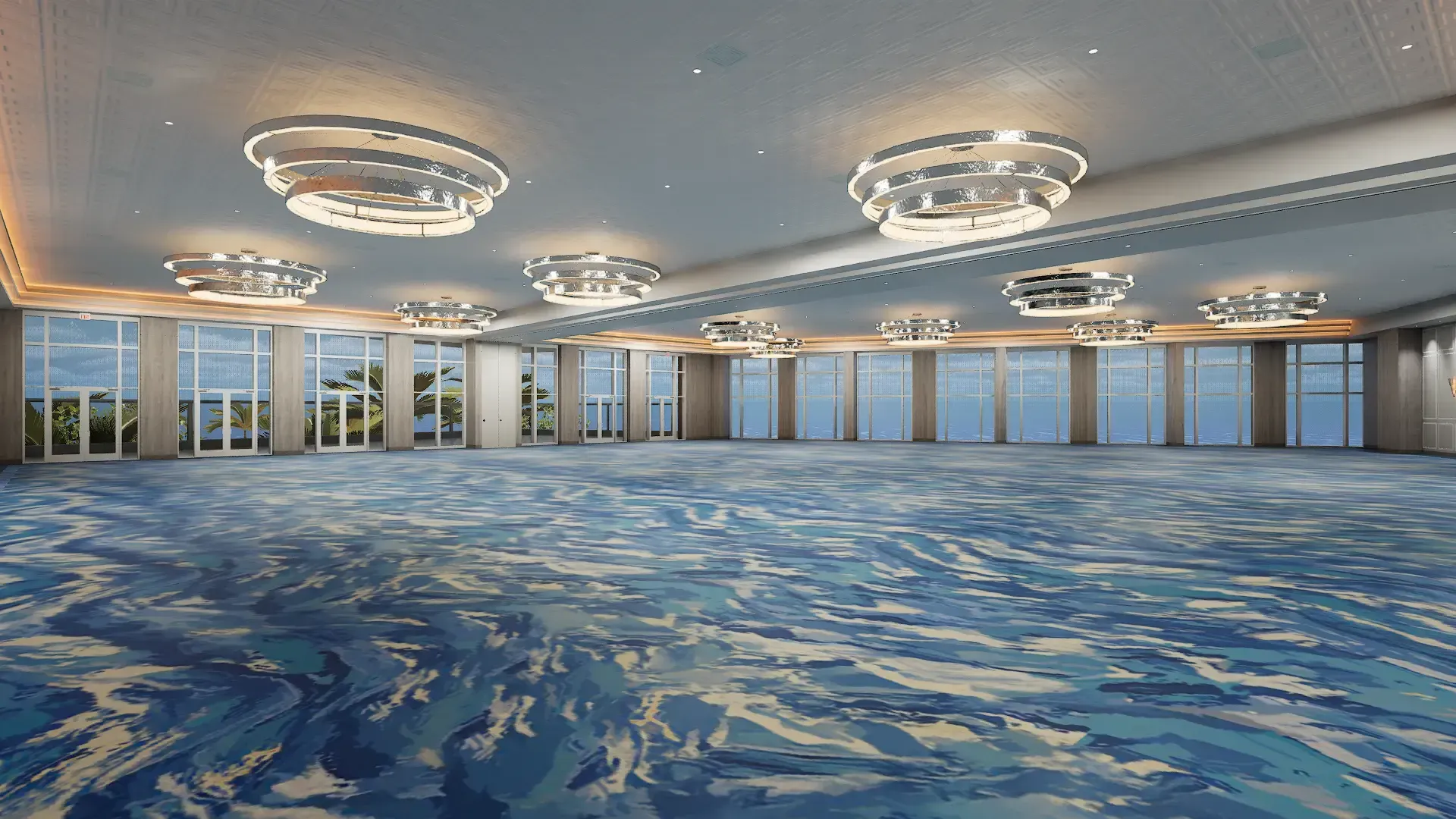 A large room with a blue carpet and lots of windows.