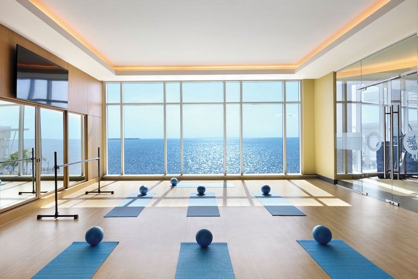 A yoga studio with a view of the ocean