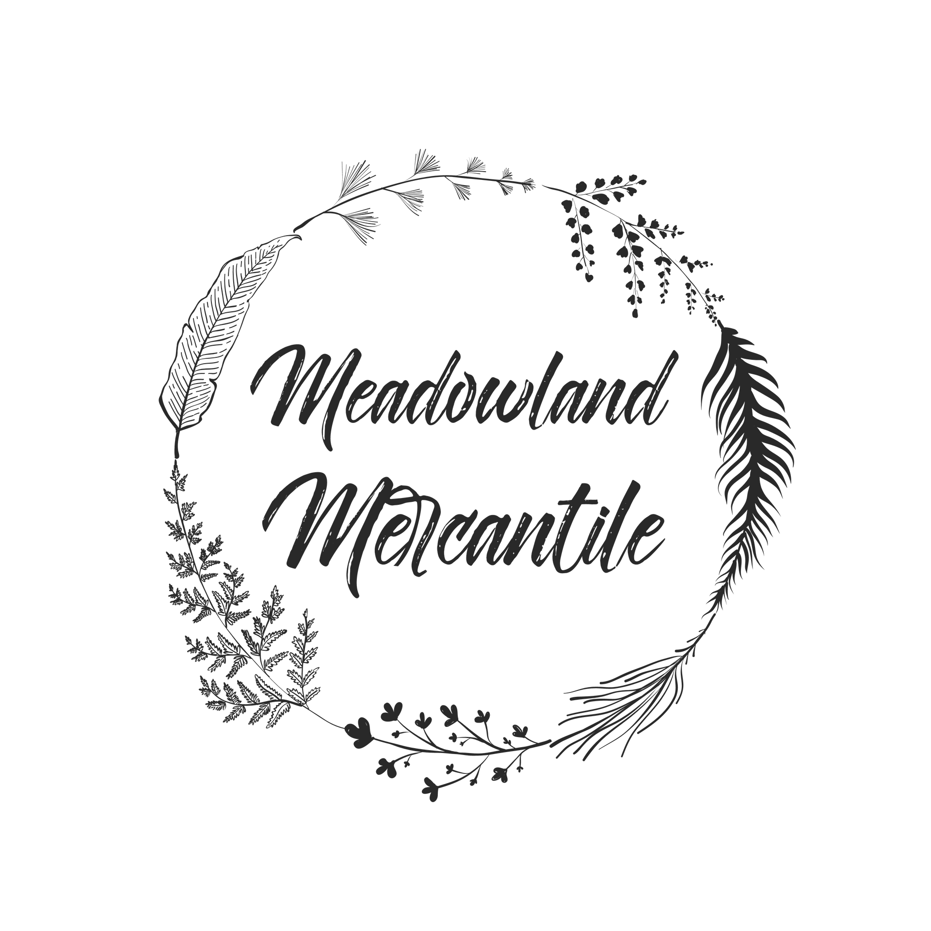 A white paper bag filled with pink and white flowers on a pink surface.