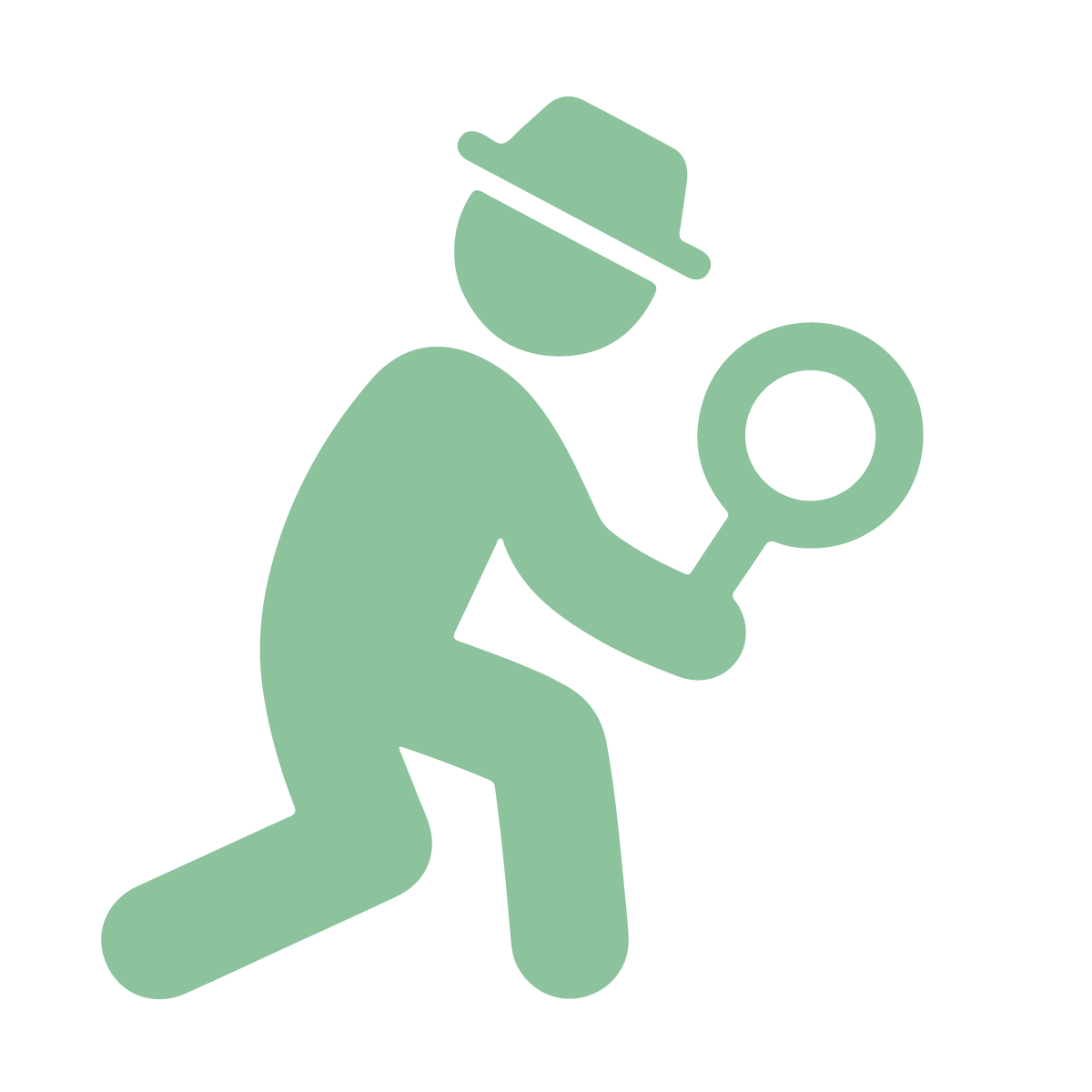 A man in a hat is looking through a magnifying glass.