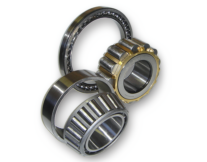 Three bearings are stacked on top of each other on a white background