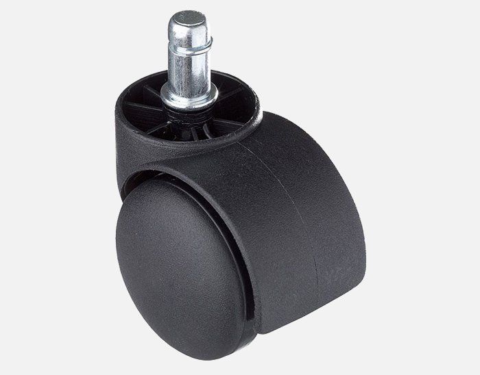 A close up of a black chair wheel on a white background