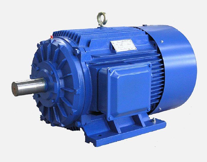 A blue electric motor is sitting on a white surface. Drives and Motors
