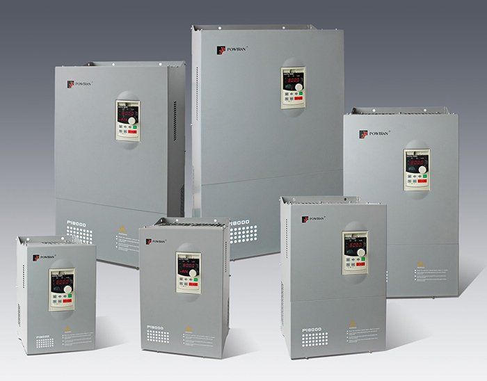 A group of gray boxes with the word emerson on them. Drives and Motors