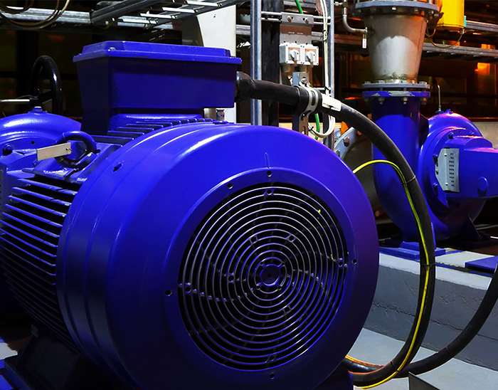 A blue motor with a fan attached to it. Drives and Motors