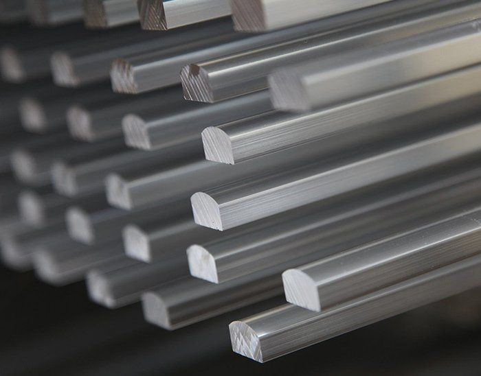 A close up of a bunch of metal bars stacked on top of each other