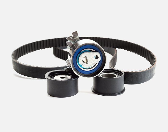 A close up of a timing belt on a white background. Power Transmission