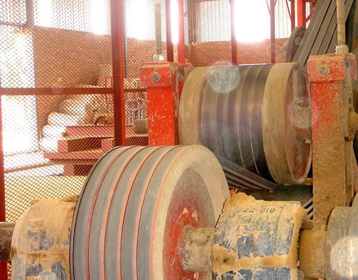 A machine that has a lot of wheels on it