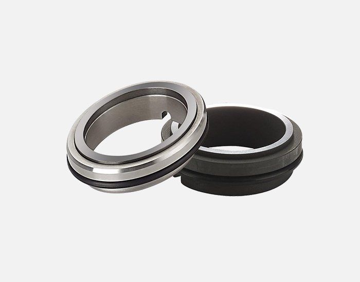 A close up of two rings on a white background.