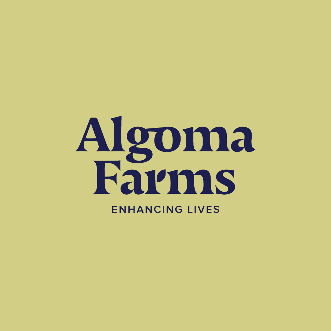The logo for algoma farms is on a yellow background.
