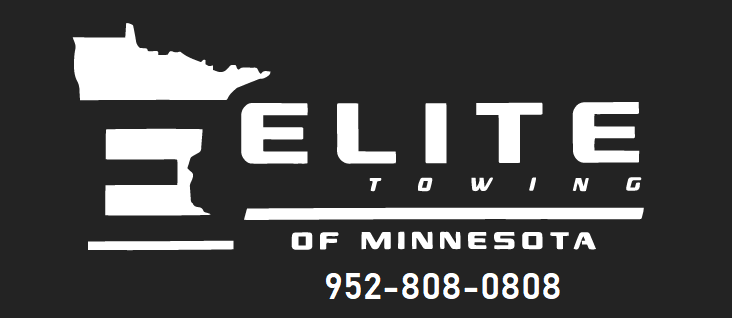 Freeway Towing logo with yellow text on a black road graphic. Address and phone number below: New Brighton, MN. | Baber Auto Repair