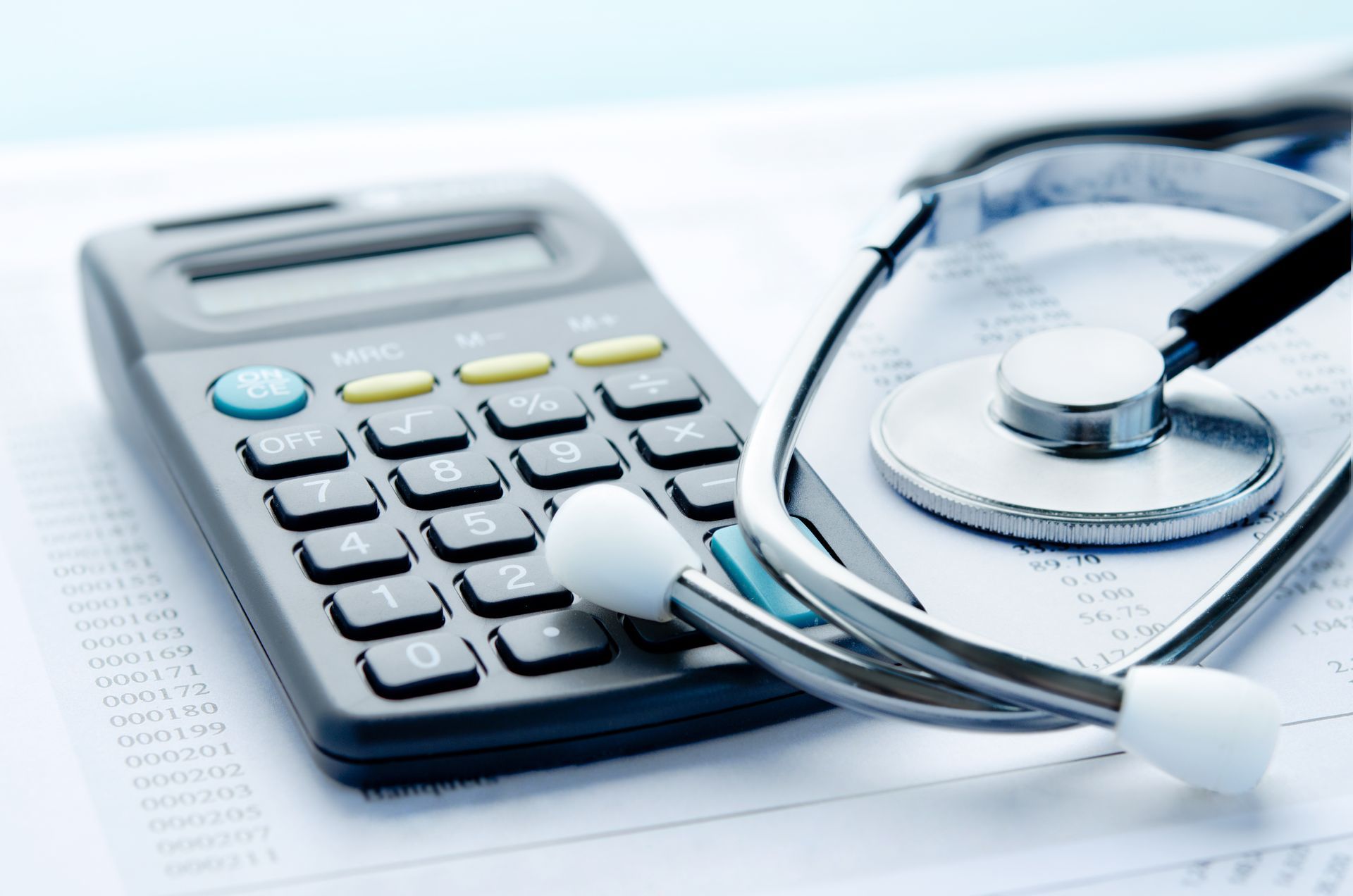calculator and stethoscope
