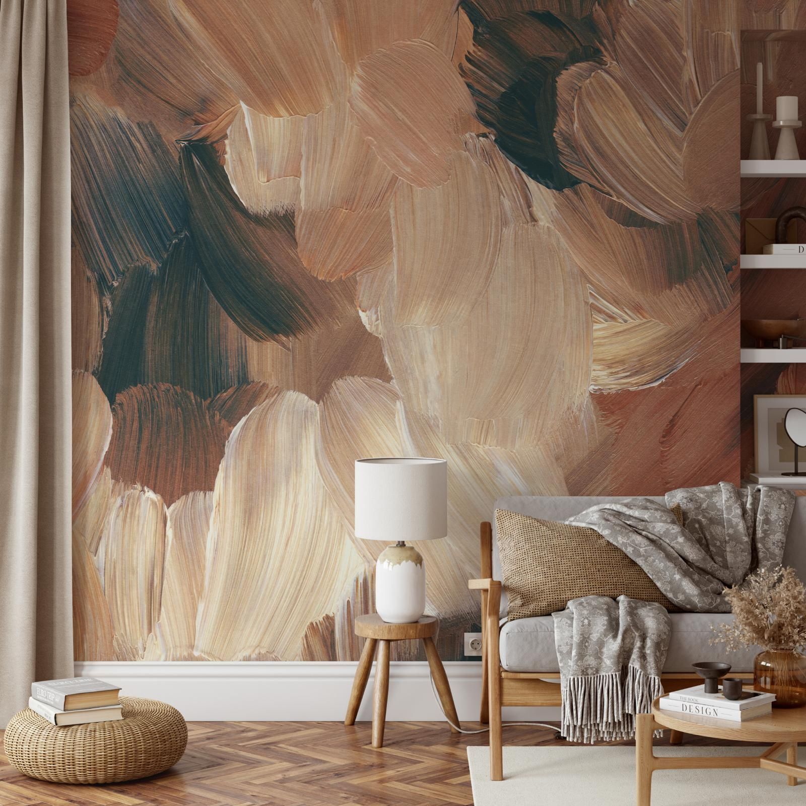 Living room with brushstroke mural in brown and beige tones, with a sofa, table, and lamp.